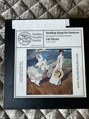 Nautilus Black, White and Blue "Strolling Along the Seashore" Wooden Puzzle